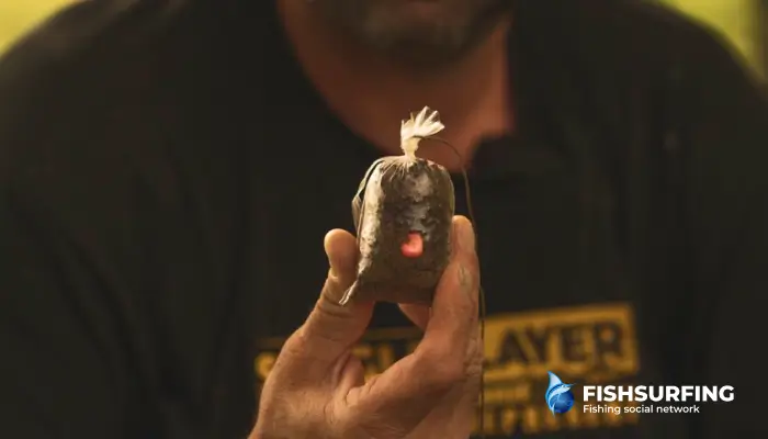 The interplay between the lure and the bait is crucial. In the picture, a solid bag designed for carp fishing.