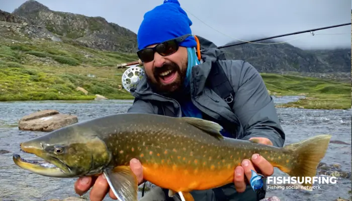 Flies are an excellent choice for larger fish, too. Just look at this incredible catch and the angler's smile.