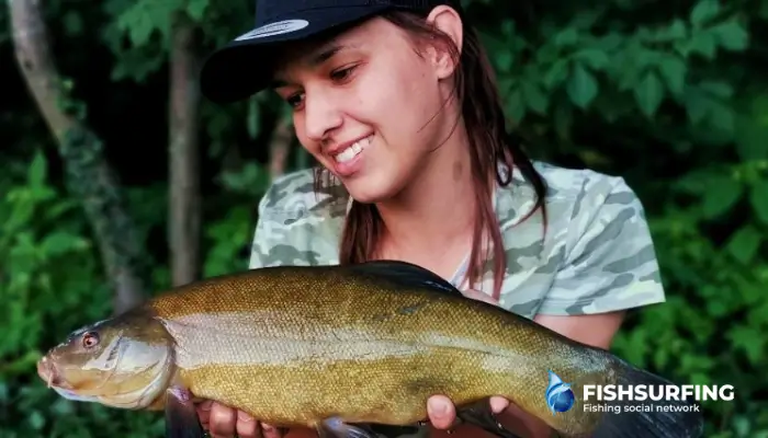 When float fishing for tench, bites can be incredibly subtle. Even the slightest dip or tilt of the float can signal a take.